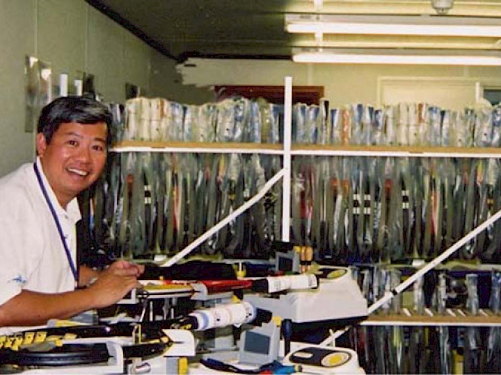 Sam in the Wimbledon stringing room